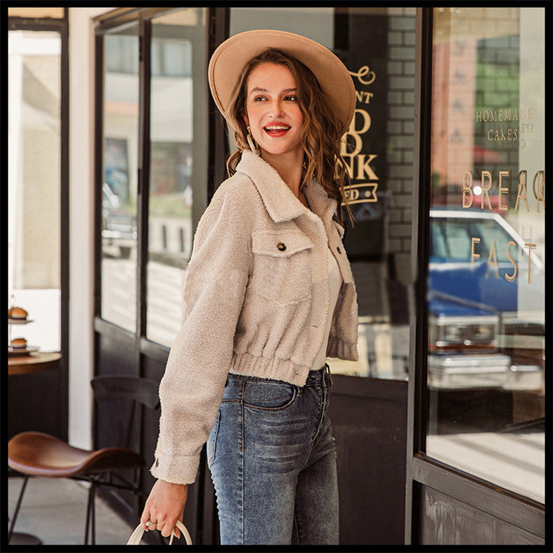 Elegant and warm women's fur coat beige short long sleeves